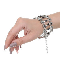 Női karkötő 1088B fekete strasszokkal