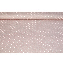 Dekoratív anyagból készült mini fehér virágok rózsaszín alapon